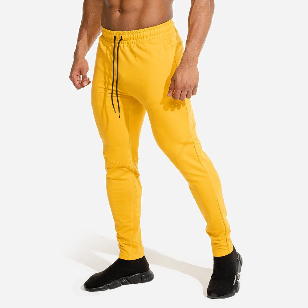 squatwolf-gym-wear-limitless-jogger-pants-yellow-workout-pants-for-men