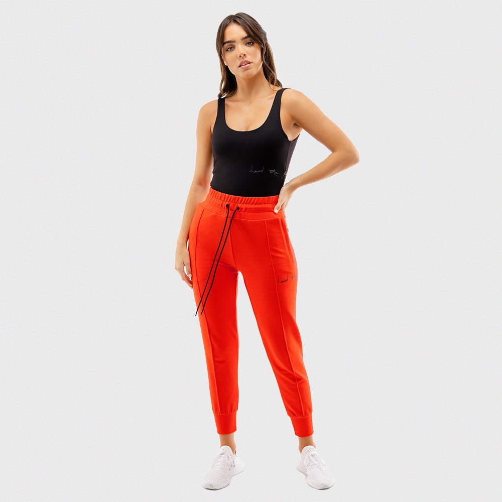 squatwolf-gym-pants-for-women-vibe-joggers-orange-workout-clothes