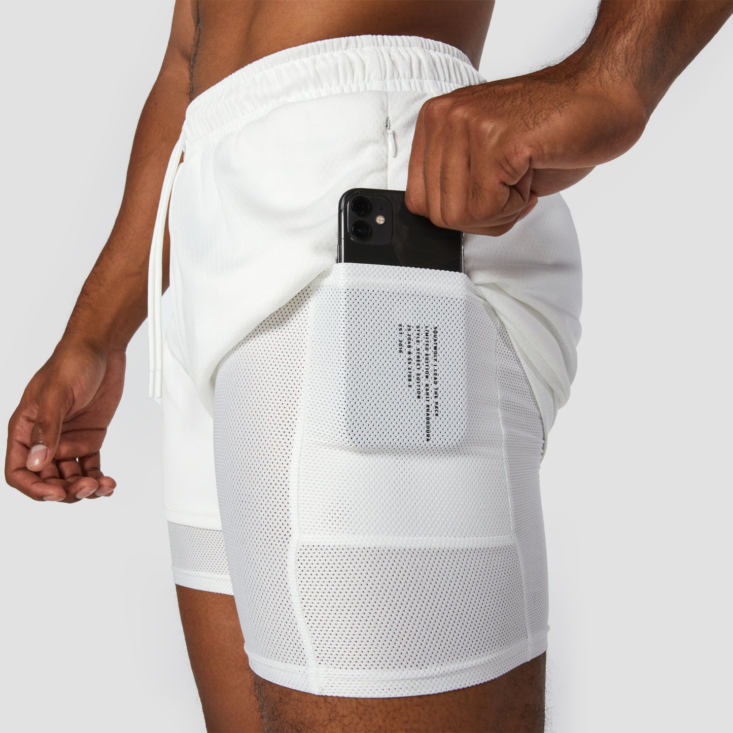 squatwolf-gym-wear-hybrid-performance-2-in-1-shorts-white-workout-shorts-for-men