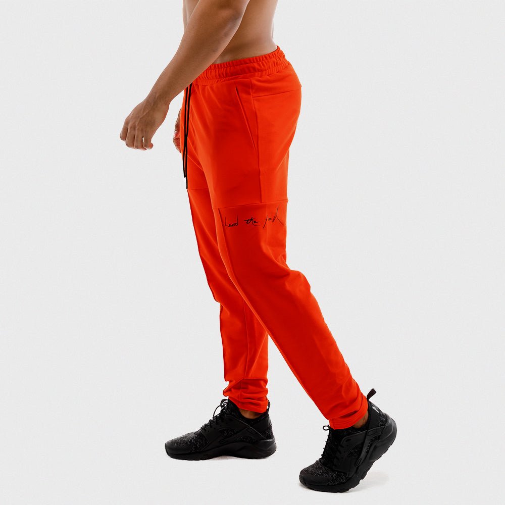 squatwolf-pants-for-men-vibe-jogger-pants-orange-workout-gym-wear