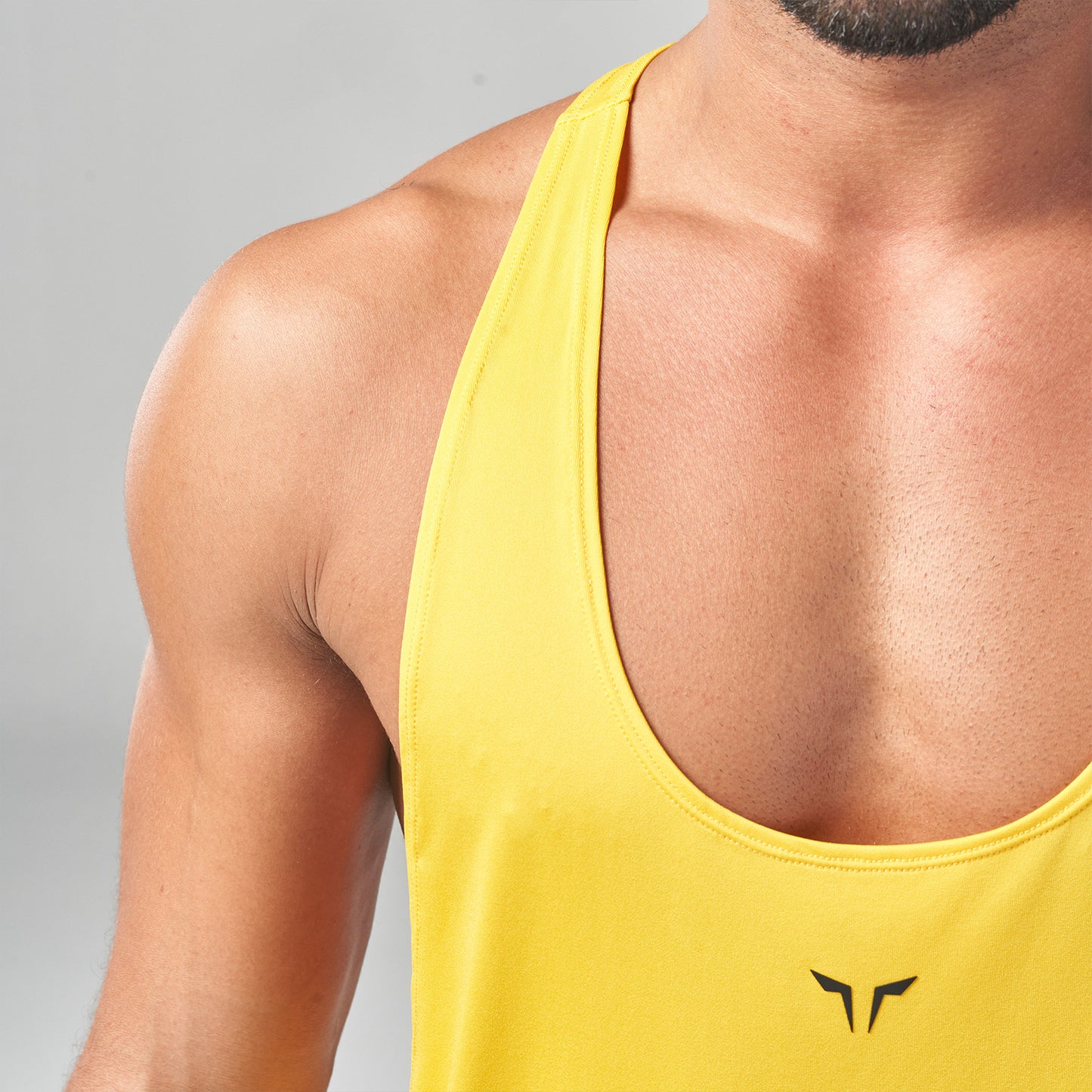 squatwolf-gym-wear-essential-gym-stringer-yellow-stringer-vests-for-men